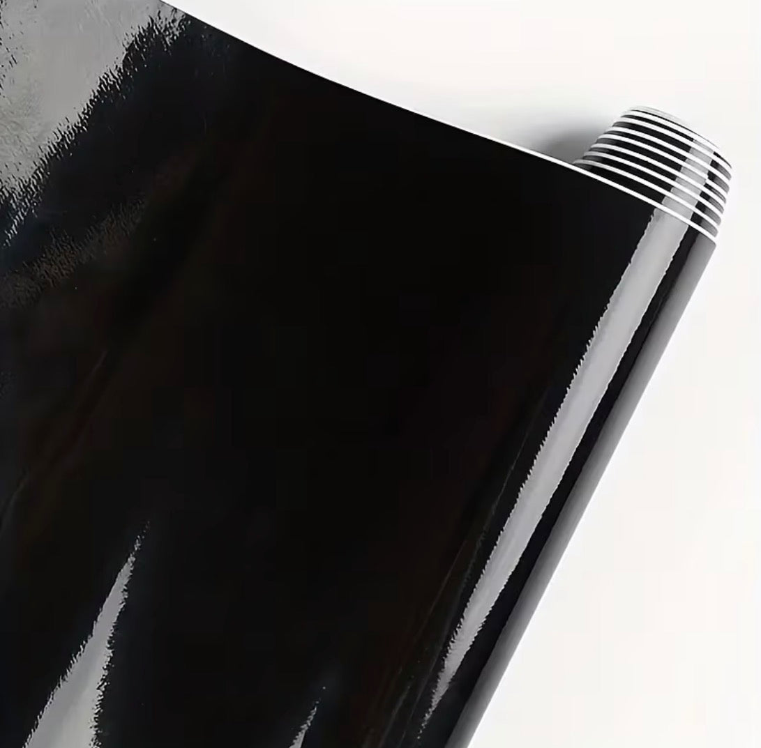 Invisible glossy black battery wrap